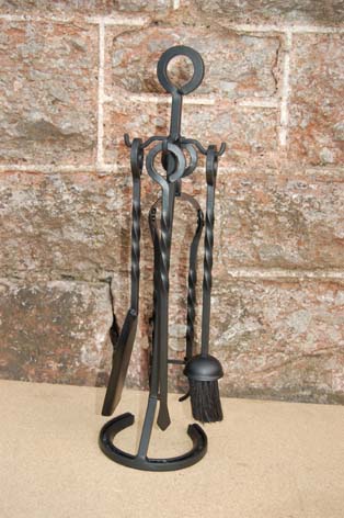 C3 Companion Set with 4 tools - poker, shovel, brush and spring tongs with a horse shoe stand.